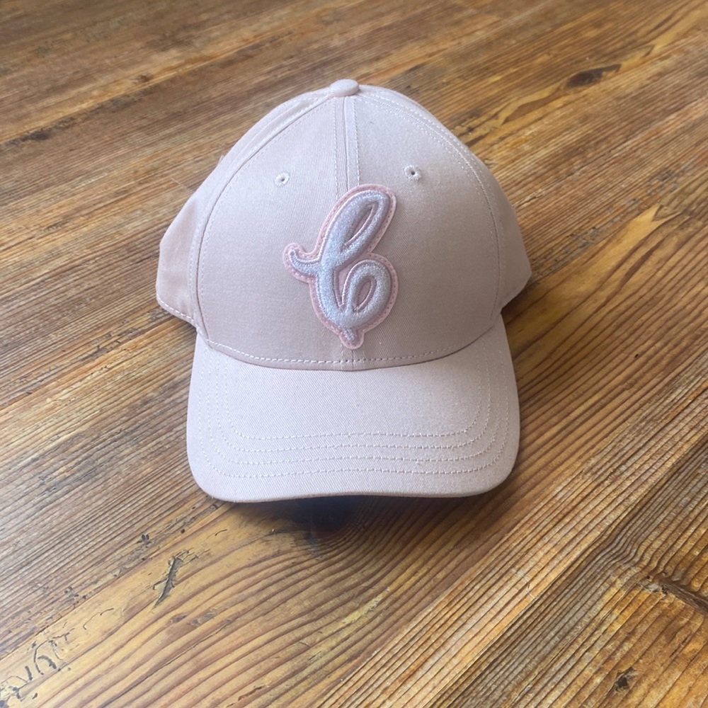 NWOT blush pink Coach hat. Never worn.